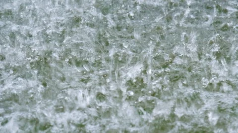 Heavy rain drops falling in the water. Rainy day. Stock Footage 115072569