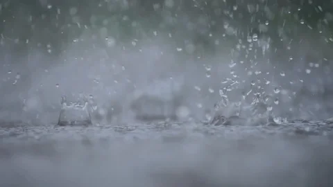 Heavy rain drops hitting ground 02 Stock Footage 90810372