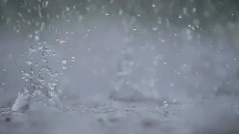 Heavy rain drops hitting ground 03 Stock Footage 90810483