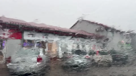 Heavy Rain Falling On Car Windshield In Parking Lot Stock Footage 340903511