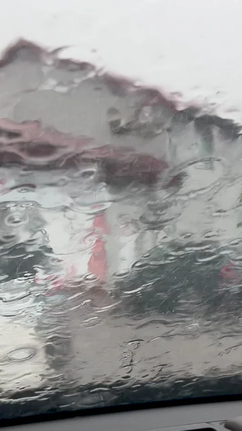 Heavy Rain Falling On Car Windshield During Stormy Weather Video stock 341416447