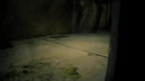 Heavy Rain Falling at Night Seen Through a Dark Balcony Frame Vídeos de archivo 321398010