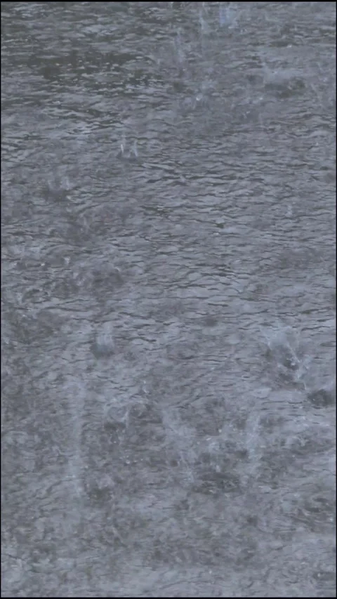 Heavy Rain Falling on Outdoor Surface - Vertical 4K 스톡 동영상 336340146