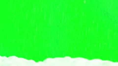 Heavy rain falling over snowy ground surface against bright green screen Stock-Footage 340942645