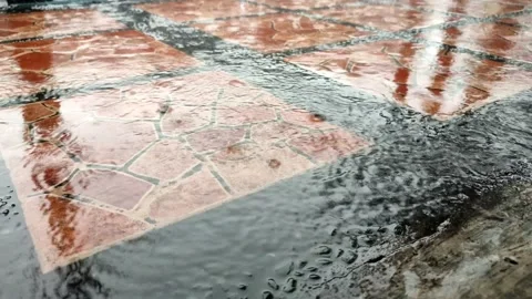 Heavy rain falling on the pavement Stock Footage 171380955