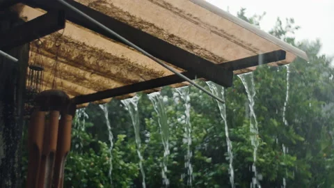 Heavy rain falling on roof Stock Footage 196612970