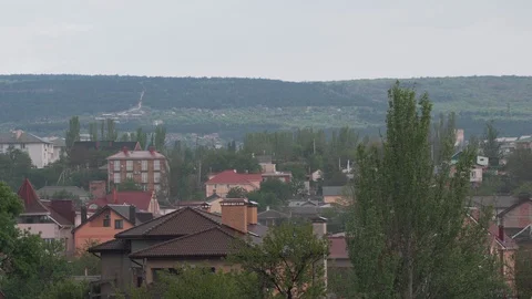 Heavy rain is falling in the town Stock Footage 129817089