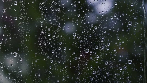 Heavy rain falling on window Video stock 144932640