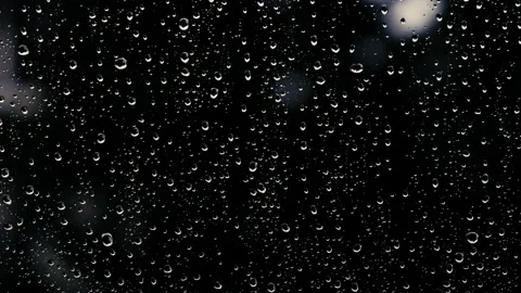 Heavy rain falling on window Video stock 144932643