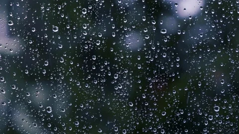 Heavy rain falling on window Video stock 144932667