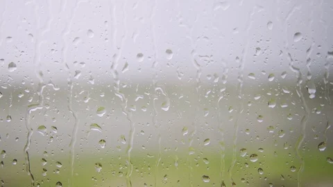 Heavy rain falling on window surface Stock Footage 108775959