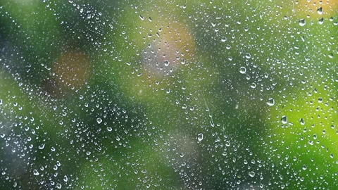 Heavy rain falling on the window surface Stock Footage 149393888