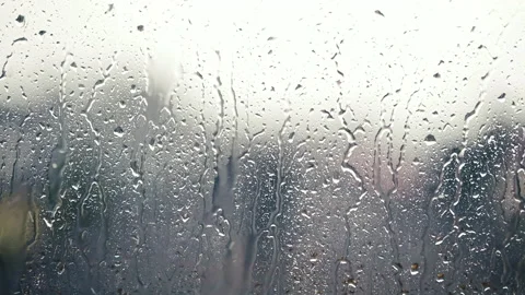 Heavy rain falling on window surface Stock Footage 150178062