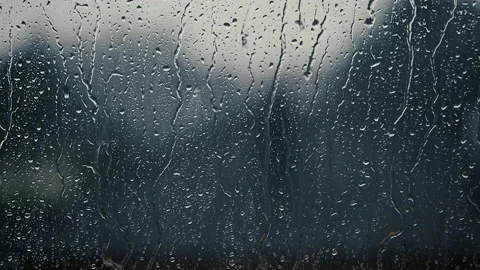 Heavy rain falling on the window surface Stock Footage 150328959