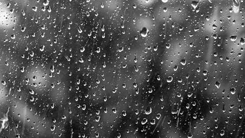 Heavy rain falling on the window surface Stock Footage 159339013