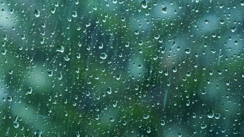Heavy rain falling on the window surface Stock Footage 159339035