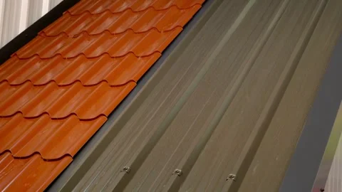 Heavy rain falls after a storm passes over a rooftop in Europe, during the day Stock Footage 336572385