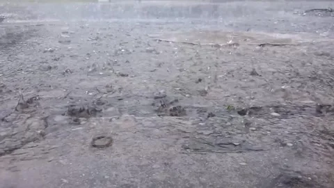 Heavy rain fell onto the streets. Video stock 288493884