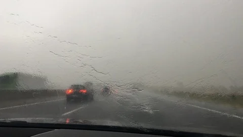 Heavy rain on the highway Stock Footage 110692715