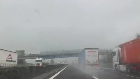 Heavy rain on a highway Video stock 289395930