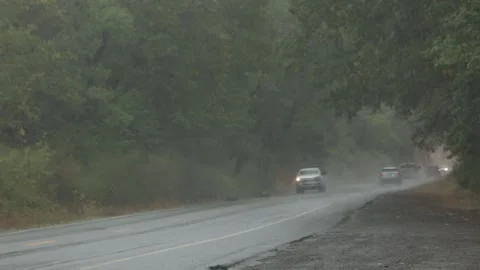 Heavy RAIN on a HIGHWAY with Windshield Wipers as CARS Drive Along, (HD 24p) Stock Footage 272173175