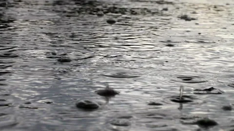 Heavy rain hitting the water surface Stock Footage 39863227