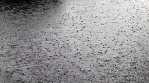 Heavy rain hitting the water surface Stock Footage 39863234