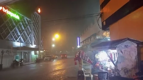 Heavy rain in the middle of the city Stock Footage 219908007