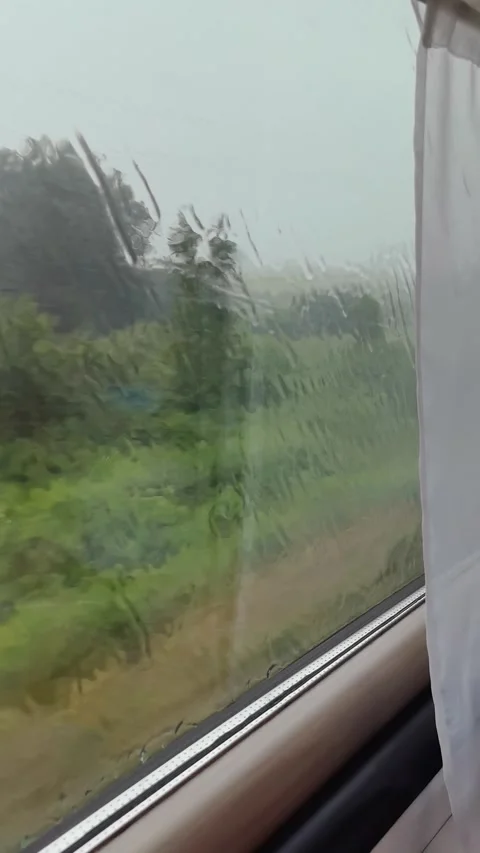 Heavy rain outside the train window. public transport Stock Footage 313728487