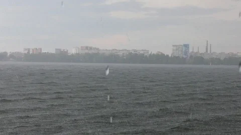 Heavy rain over the river Stock Footage 125300423