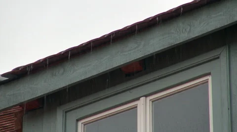 Heavy rain over rooftop, windows, drainpipe, tiles, bad weather Stock Footage 47485227