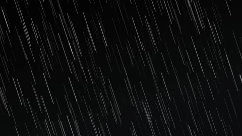Heavy rain overlay falling on black background for cinematic atmospheric Stock Footage 346708601