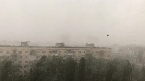 Heavy rain pounding window view from flat Stockbeeldmateriaal 113801127