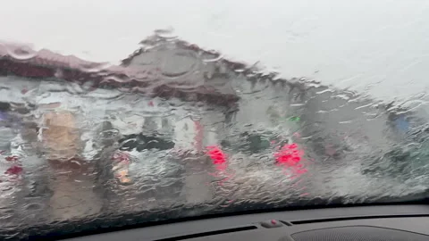Heavy Rain Pouring On Car Windshield During Stormy Weather Video stock 341415719