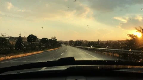 Heavy rain is raining on the trip and the car wipers are working Vídeo Stock 138118999