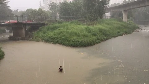 Heavy rain on the river Stock Footage 104098585