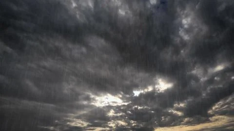 Heavy rain on sky with clouds - nice weather backdrop - photo of nature Stockfoto's