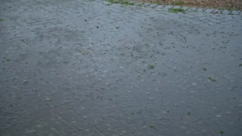 Heavy rain splashing on the ground Stock Footage 309106322