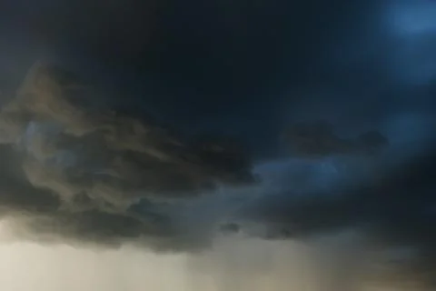 Heavy rain storm clouds, thunderstorm dramatic sky, bad day weather backgroun Stock Photos
