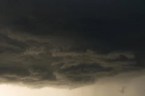 Heavy rain storm clouds, thunderstorm dramatic sky, bad day weather backgroun Stock Photos