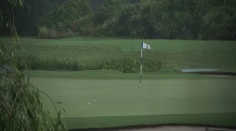 Heavy Rain Storm at Golf Course with Flag Blowing Stock-Footage 40337467