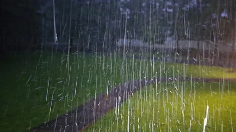 Heavy rain storm illuminated drops Stock Footage 280522973