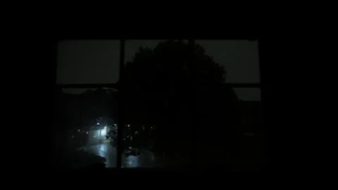 Heavy rain storm rain falls. view from throw window houses. Storm time. Wide 库存影片 285111324