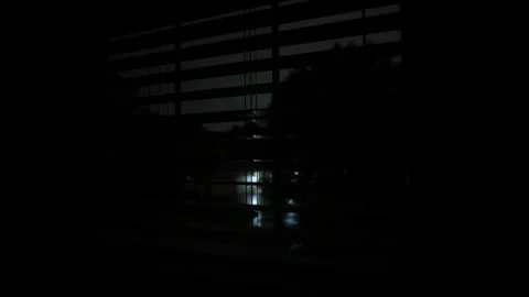 Heavy rain storm rain falls. view from throw window houses. Storm time. Wide Stock Footage 285457611