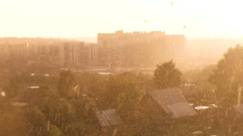 Heavy rain with sun. Beautiful view of the city. Stock Footage