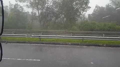 Heavy Rain Video, Recorded Inside a Car on the Side of the Road. Stock Footage 304963565