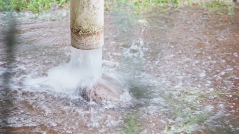 Heavy rain water pouring down the downspout drain pipe. Stock Footage 166015624