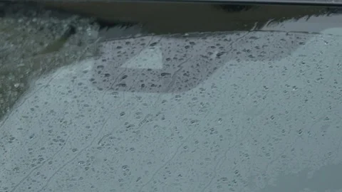 Heavy Rain Water Streams on Car Windshield Close Up Stock Footage 345203133