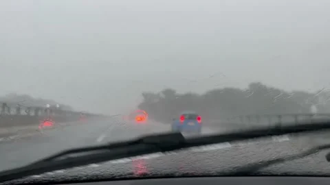 Heavy rain while driving on highway Stock Footage 206662827