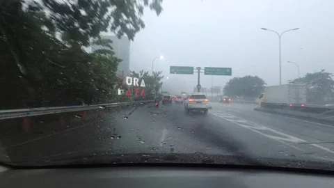 Heavy Rain while Driving, Surabaya East Java, Indonesia, Asia Stock-Footage 129059511
